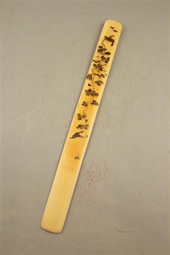 A Japanese ivory and shibayama type page turner, Meiji period, 38cm., restorations